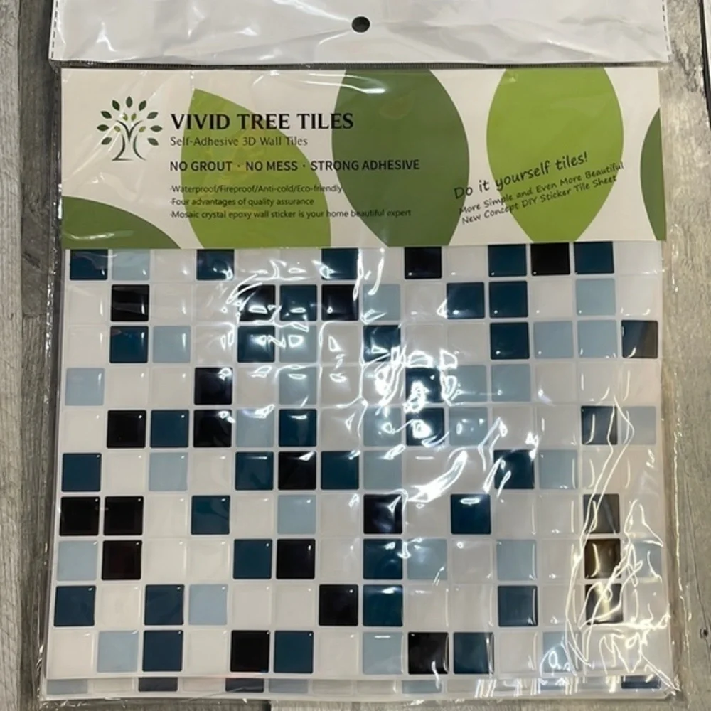 SELF-ADHESIVE 3D wall tiles. New in package.  10x10. 6 tiles. White, blue, black